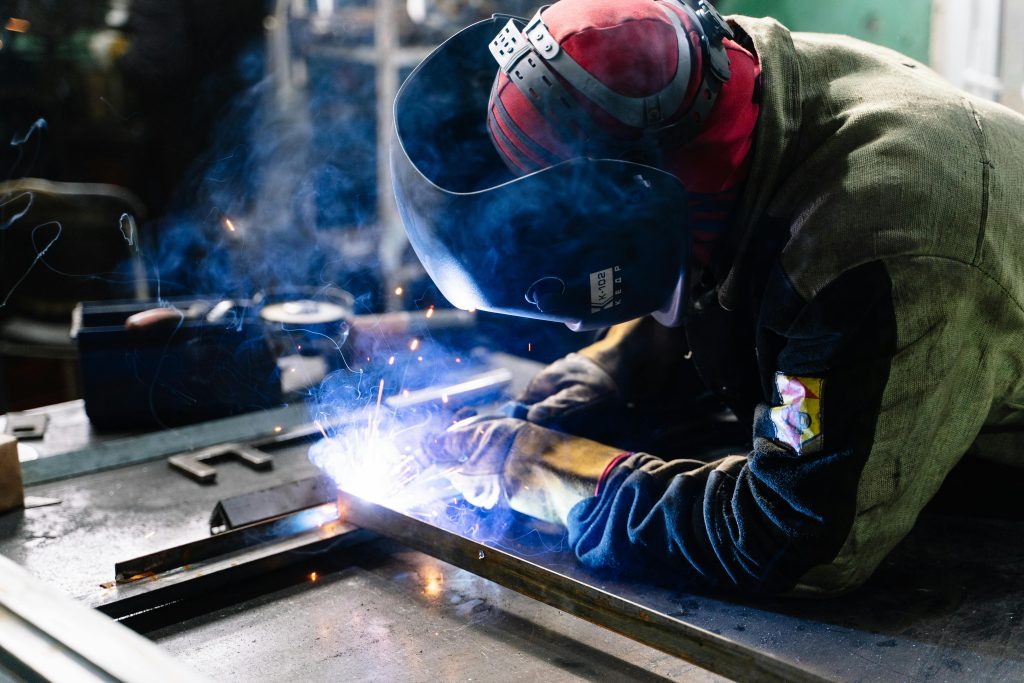 pexels-photo-2381463-2381463 Man Welding Metal Bars